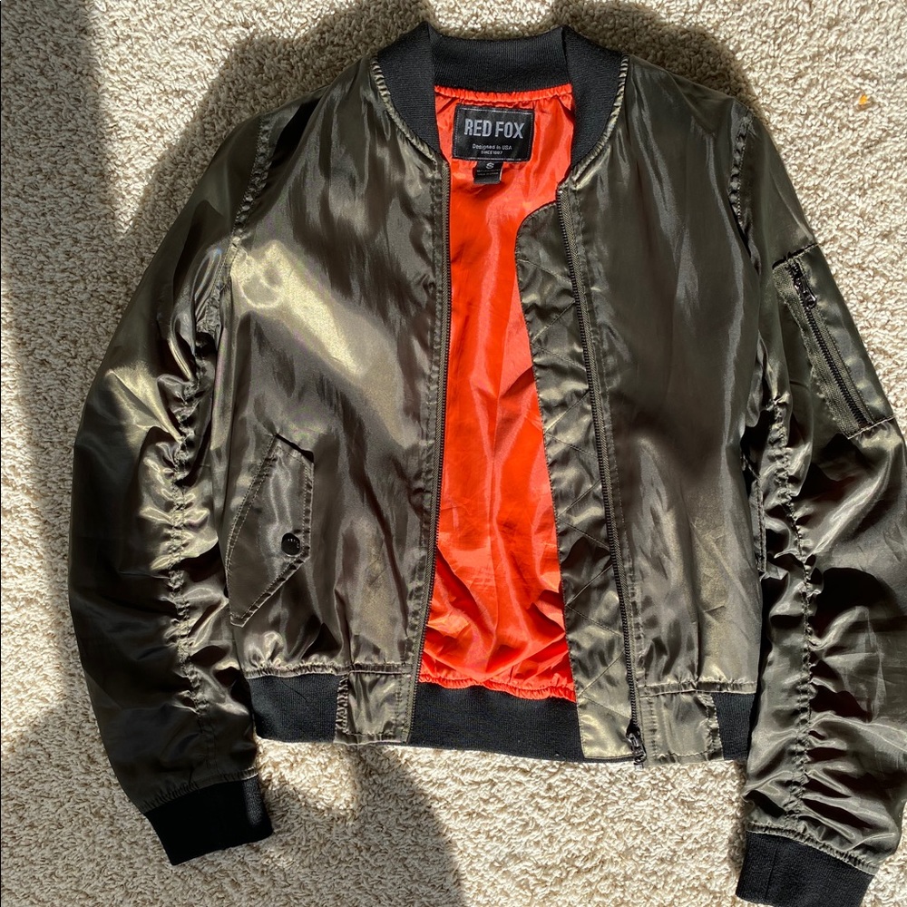 Olive colored bomber jacket. New, never worn